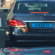 Zoomed-in view of the HUD. It is difficult to photograph well, as the phone camera doesn’t capture the 3D effect quite the same way as the human eye does. The rectangle above km/h is a bar that has been filing as we approach the turn that is now 20 m away. Stopped at the red light behind the Benz, we were almost there, so the little sliver at the top of the graph is a visual cue that we are almost at the turn. At the top “Haarlemmerplein” is the street we need to turn left onto. The map just shows what you need to do in a simple view so you can focus on driving and not on the map.